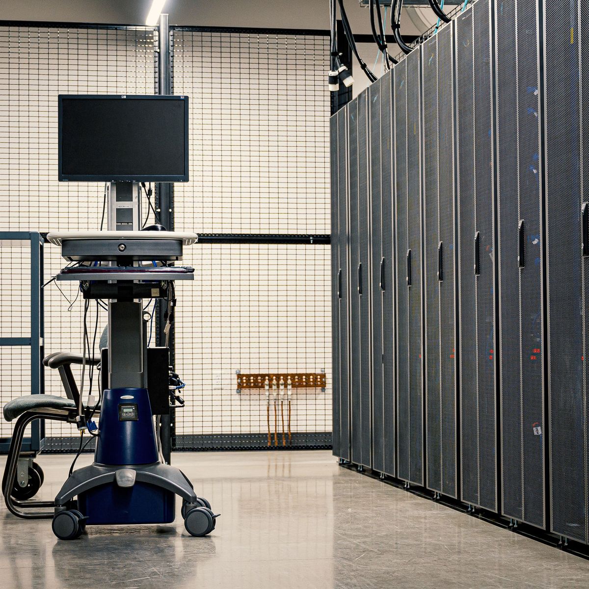 Server racks in a data centre aisle